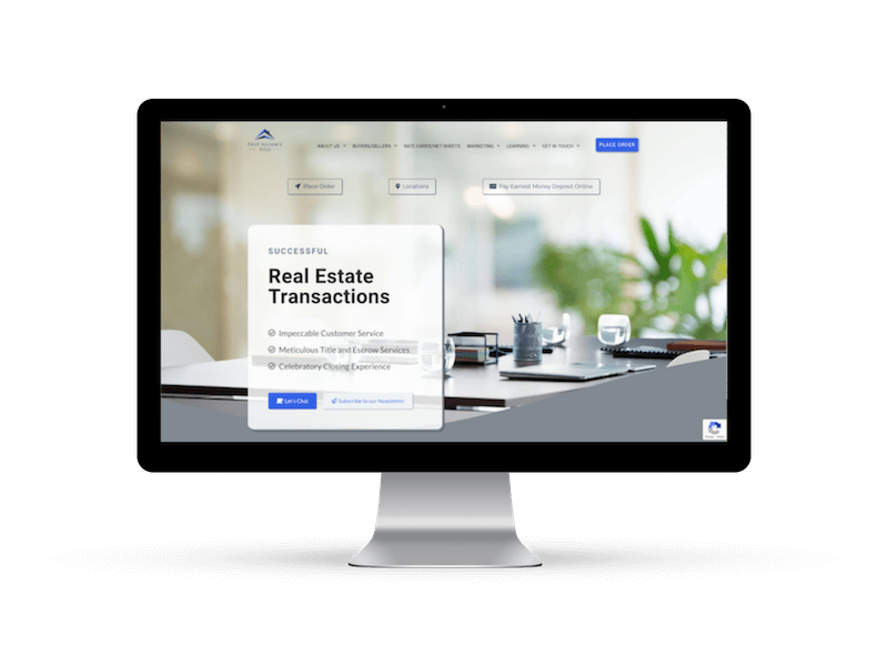 desktop computer showing the First Alliance Title home page